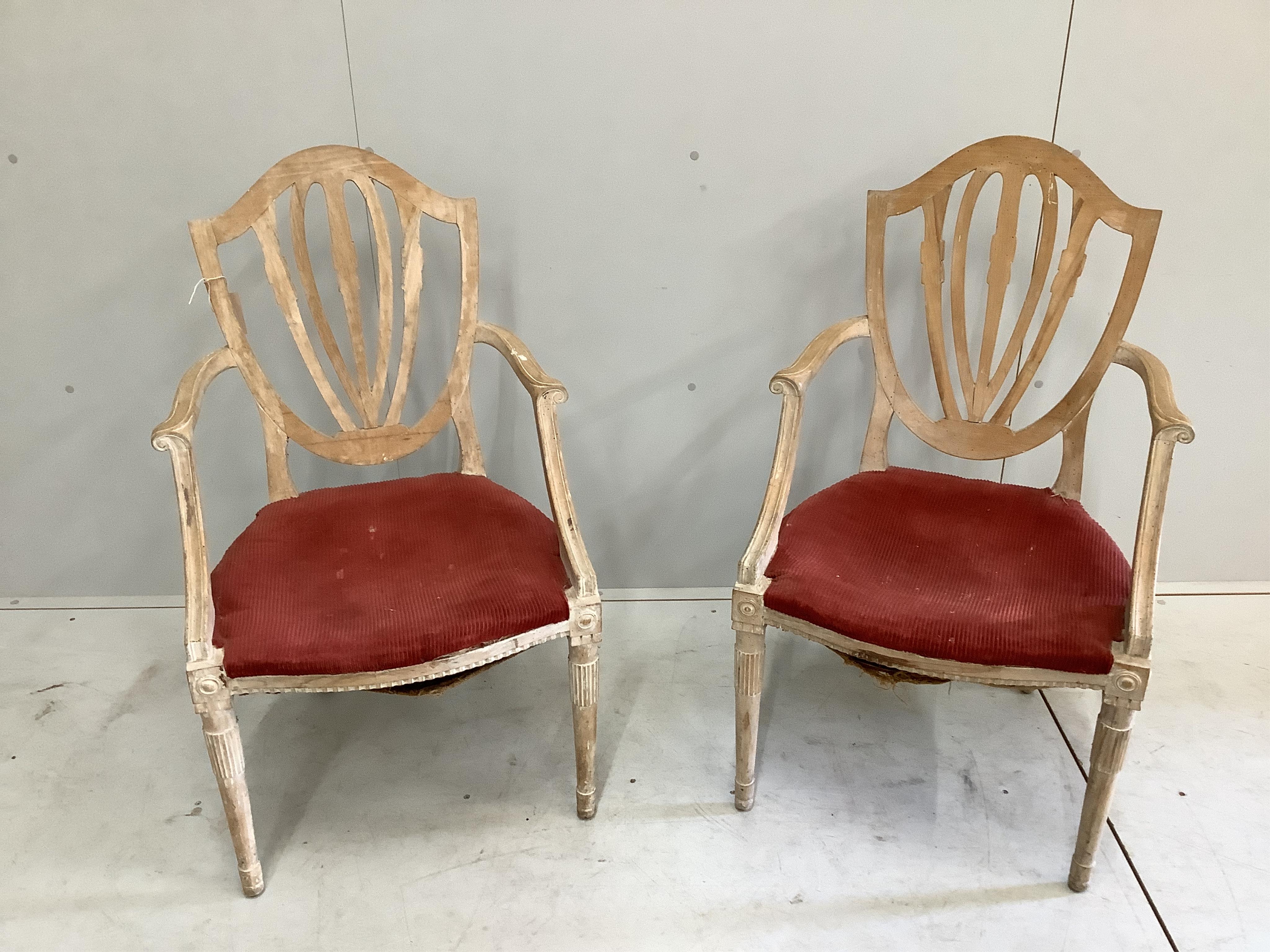 A pair of bleached mahogany Hepplewhite style elbow chairs, width 58cm, depth 49cm, height 86cm